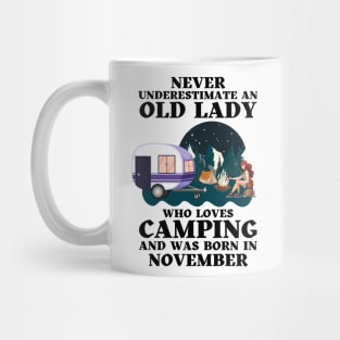 Never Underestimate An Old Lady Who Loves Camping and was born in November Mug